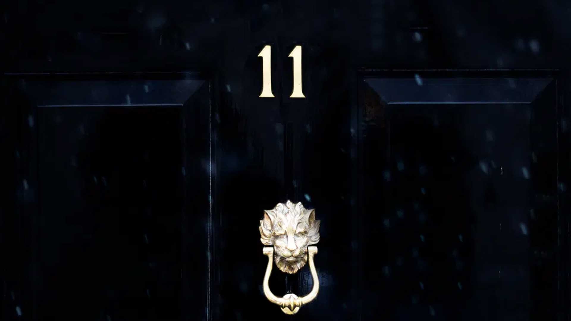 A door with 11 and a knocker