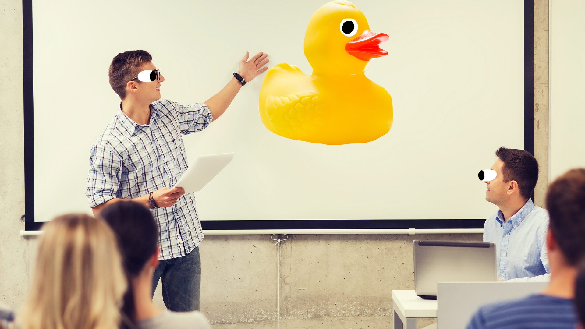 Guy giving presentation with goofy Beano rubber duck