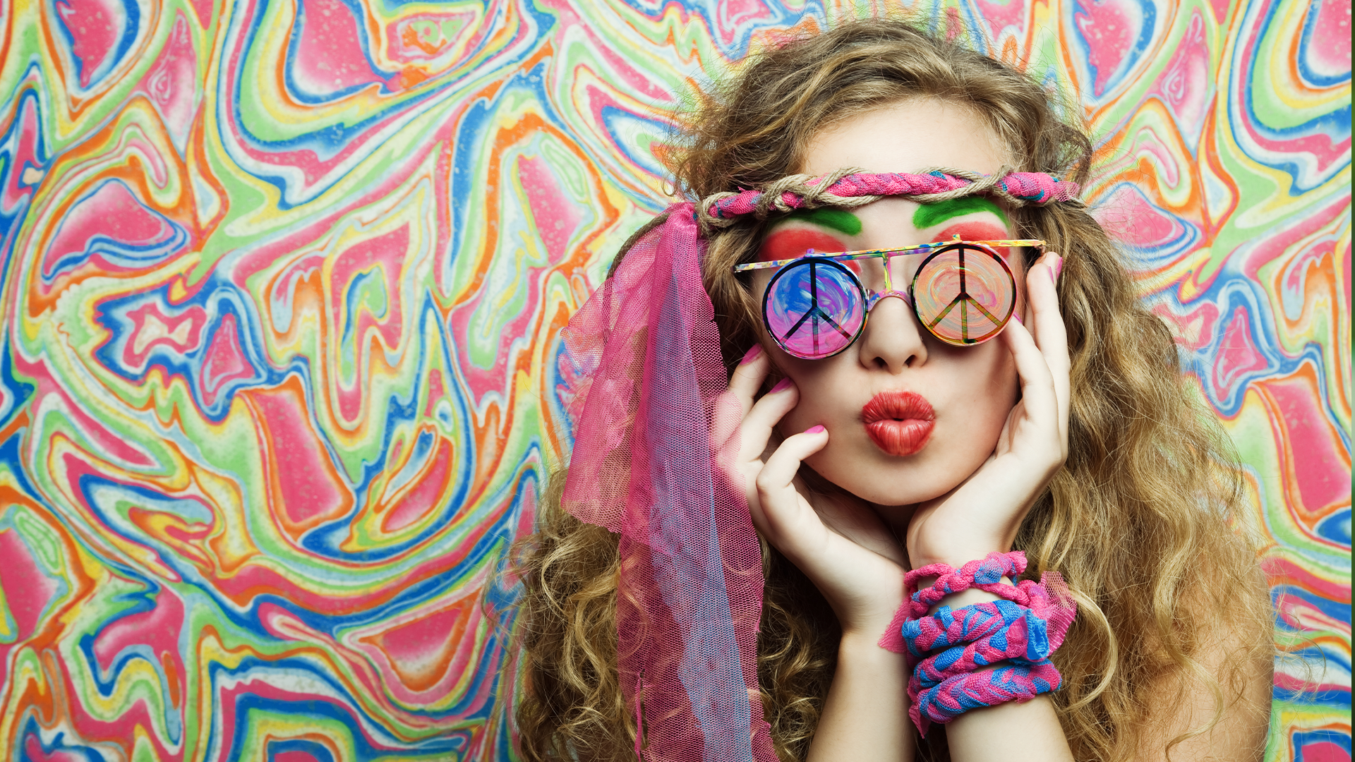 Hippy girl with peace symbol sunglasses