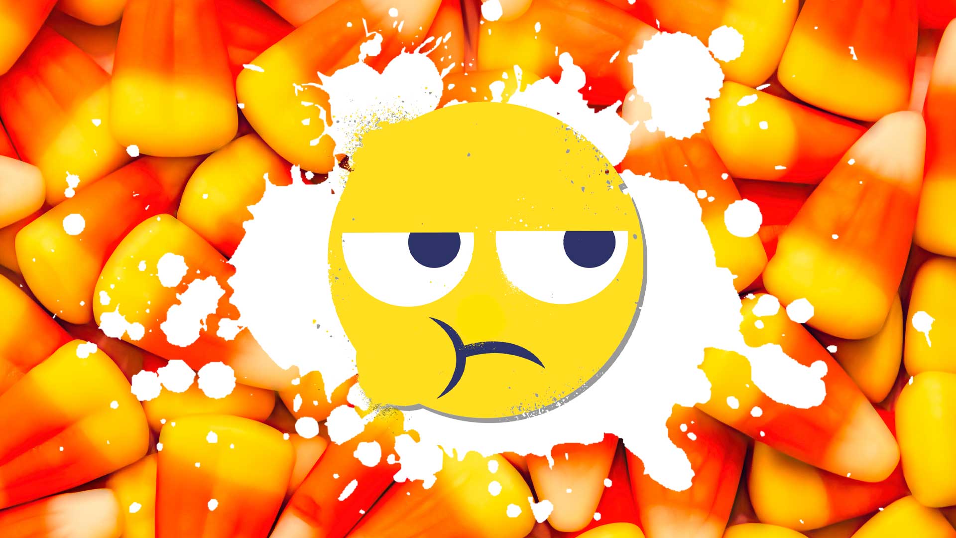 A chewing emoji on a backdrop of candy corn