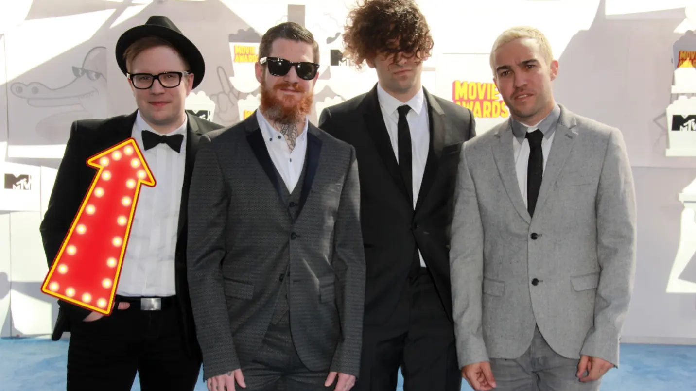 Fall Out Boy with their singer Patrick Stump highlighted with a fancy arrow