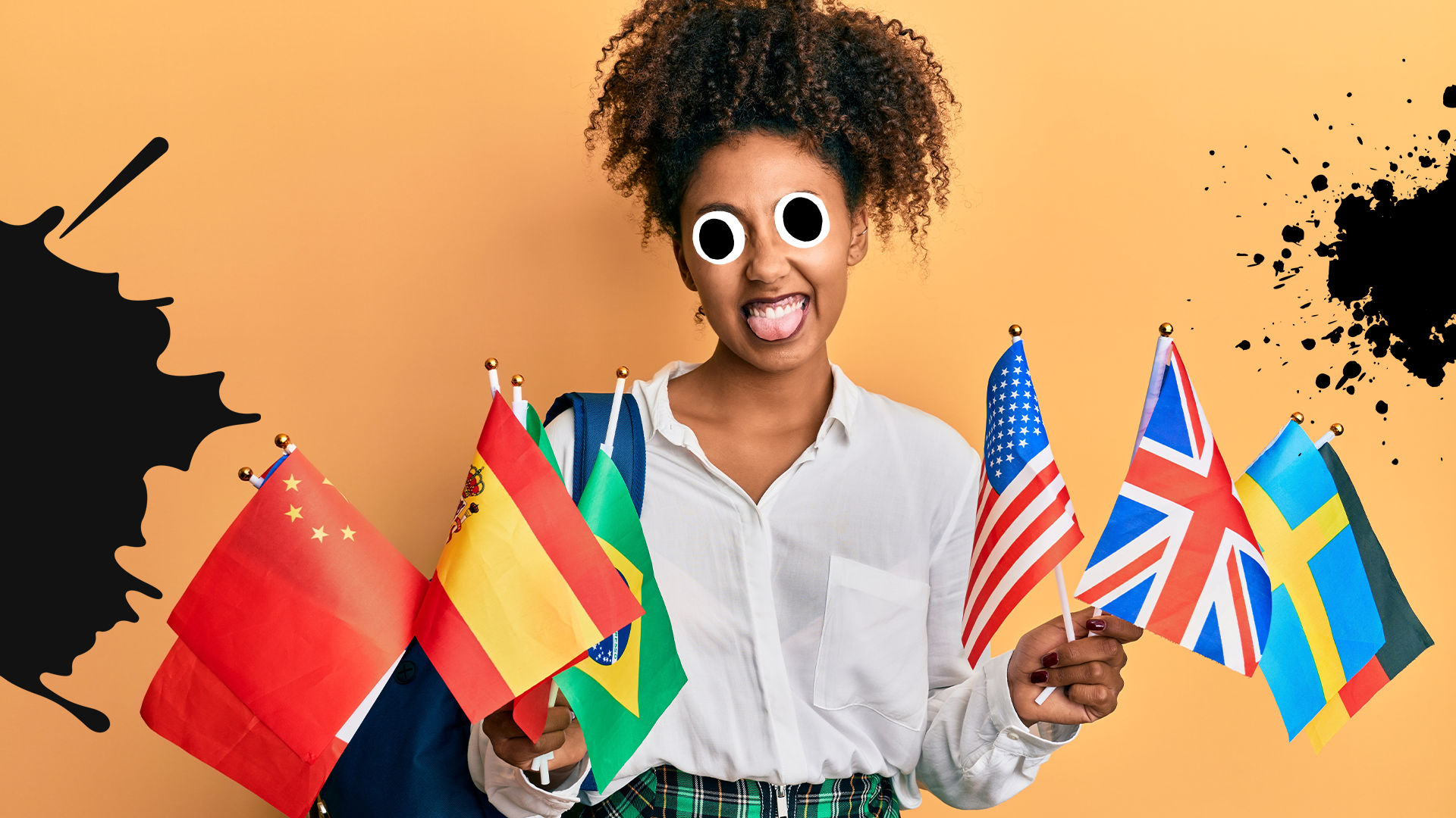Woman holding world flags on orange background with splats
