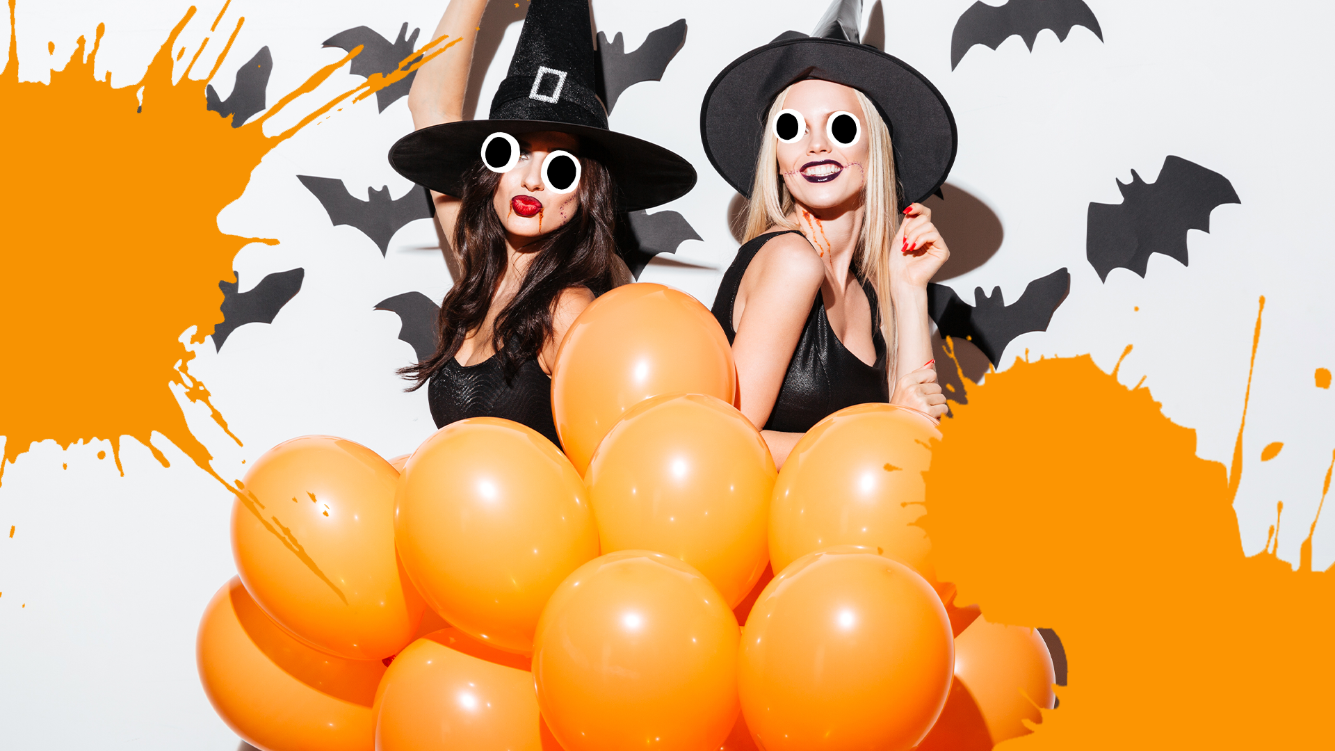 Two fun witches with orange balloons and orange splats