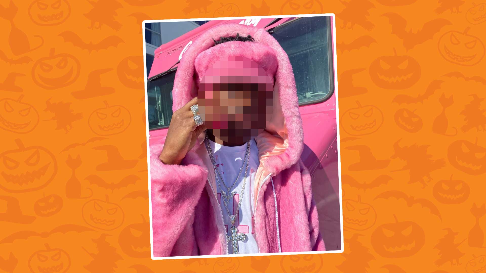 A man dressed as a pink rabbit