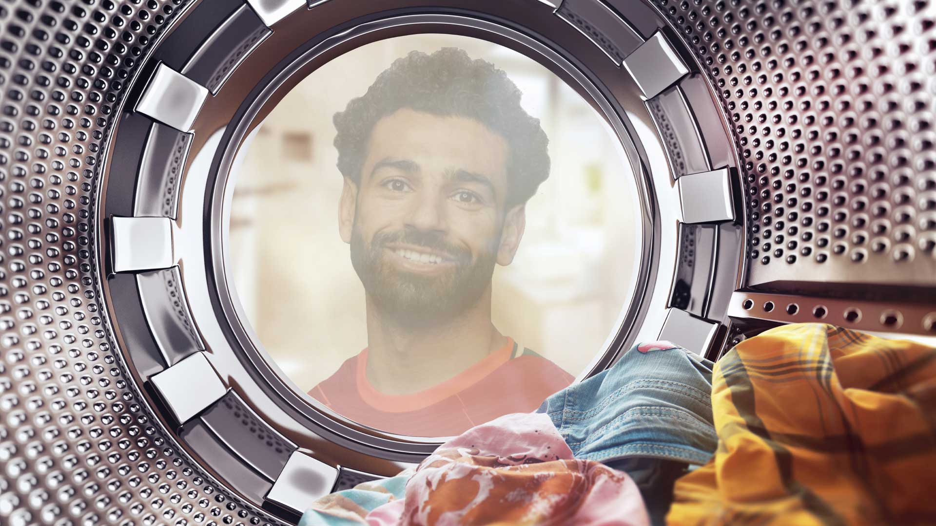 Mo Salah staring into a washing machine