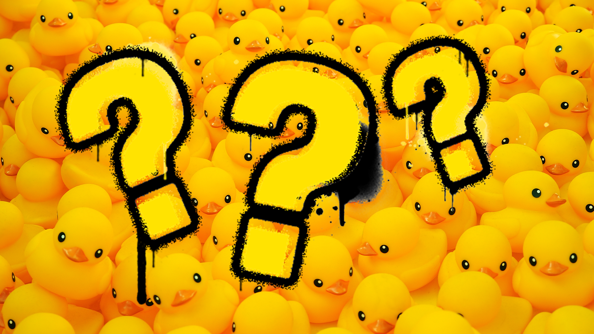 Question marks on rubber duck background 