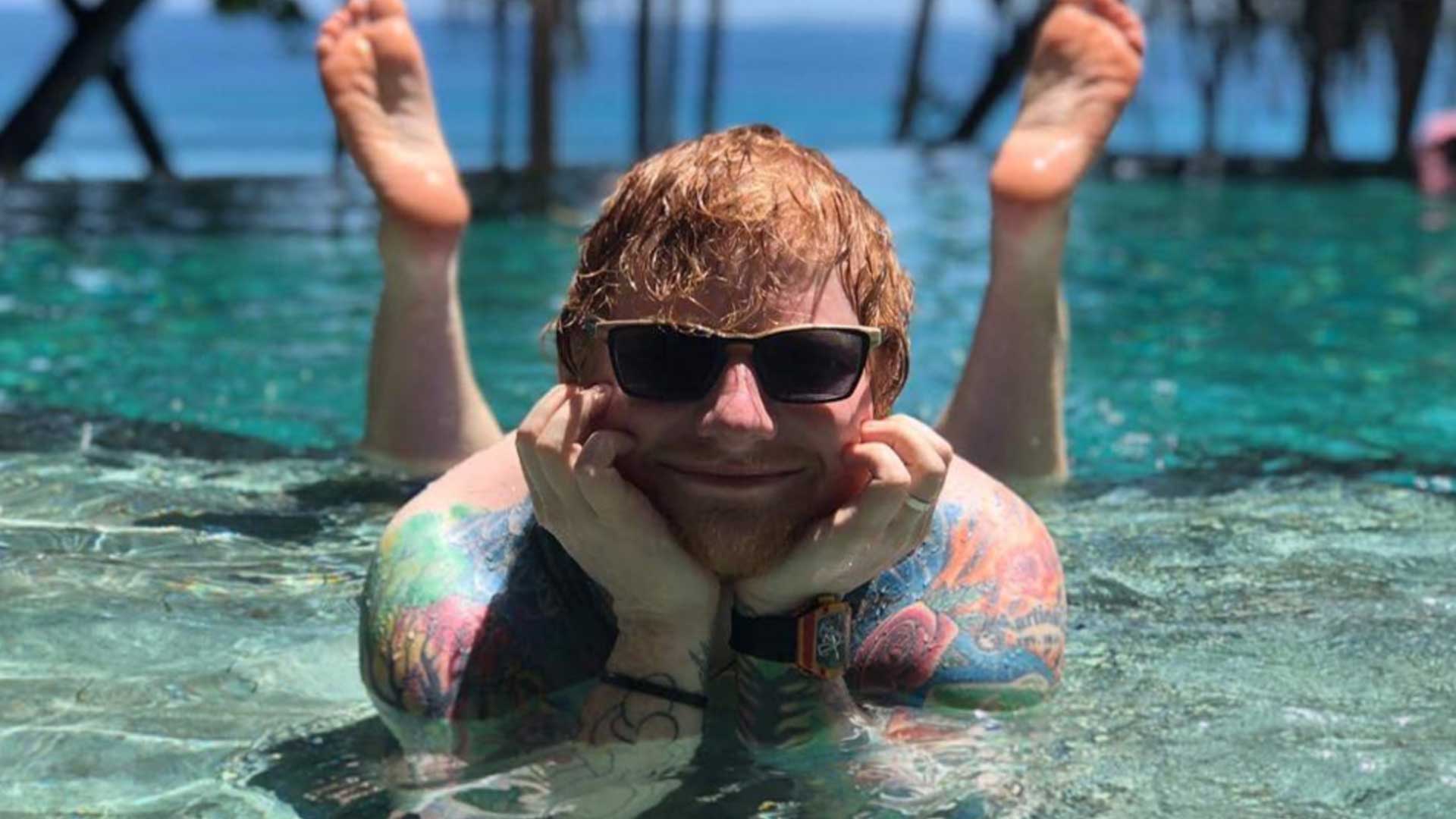 Ed Sheeran on a beach