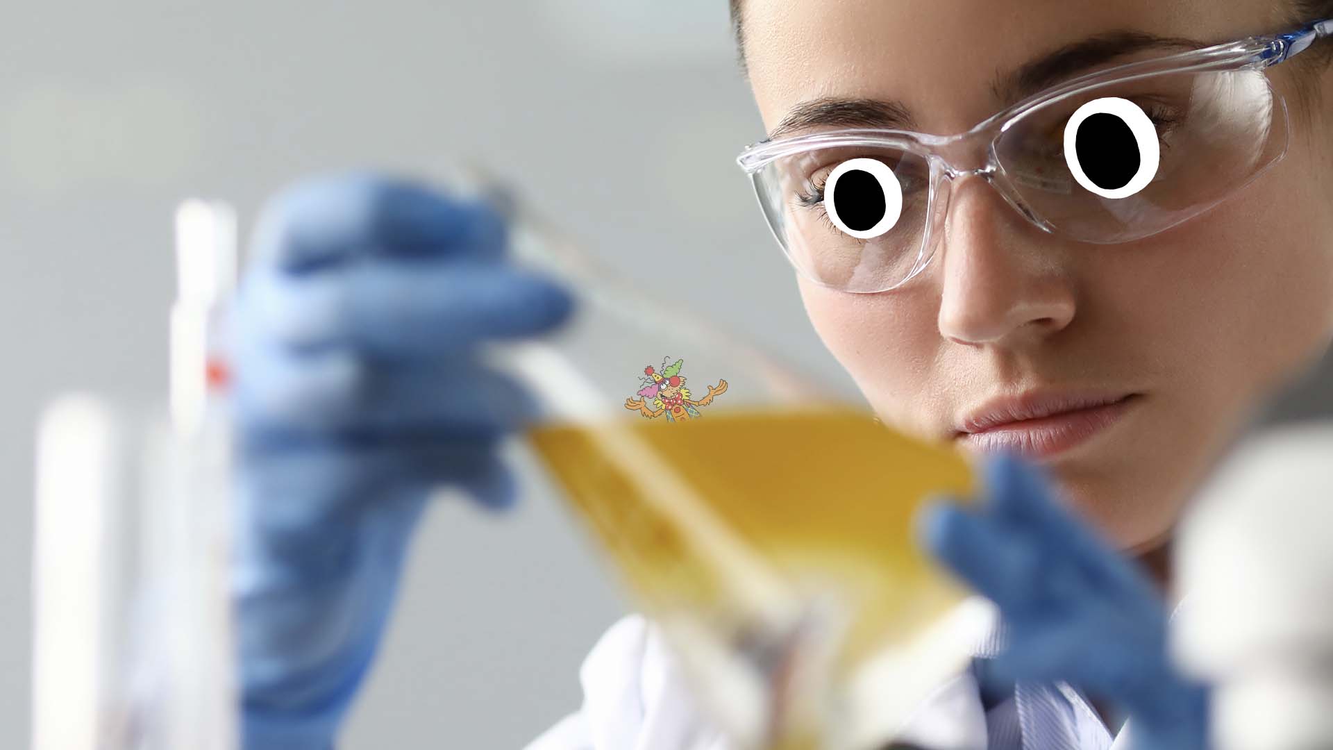 A scientist examining a flea