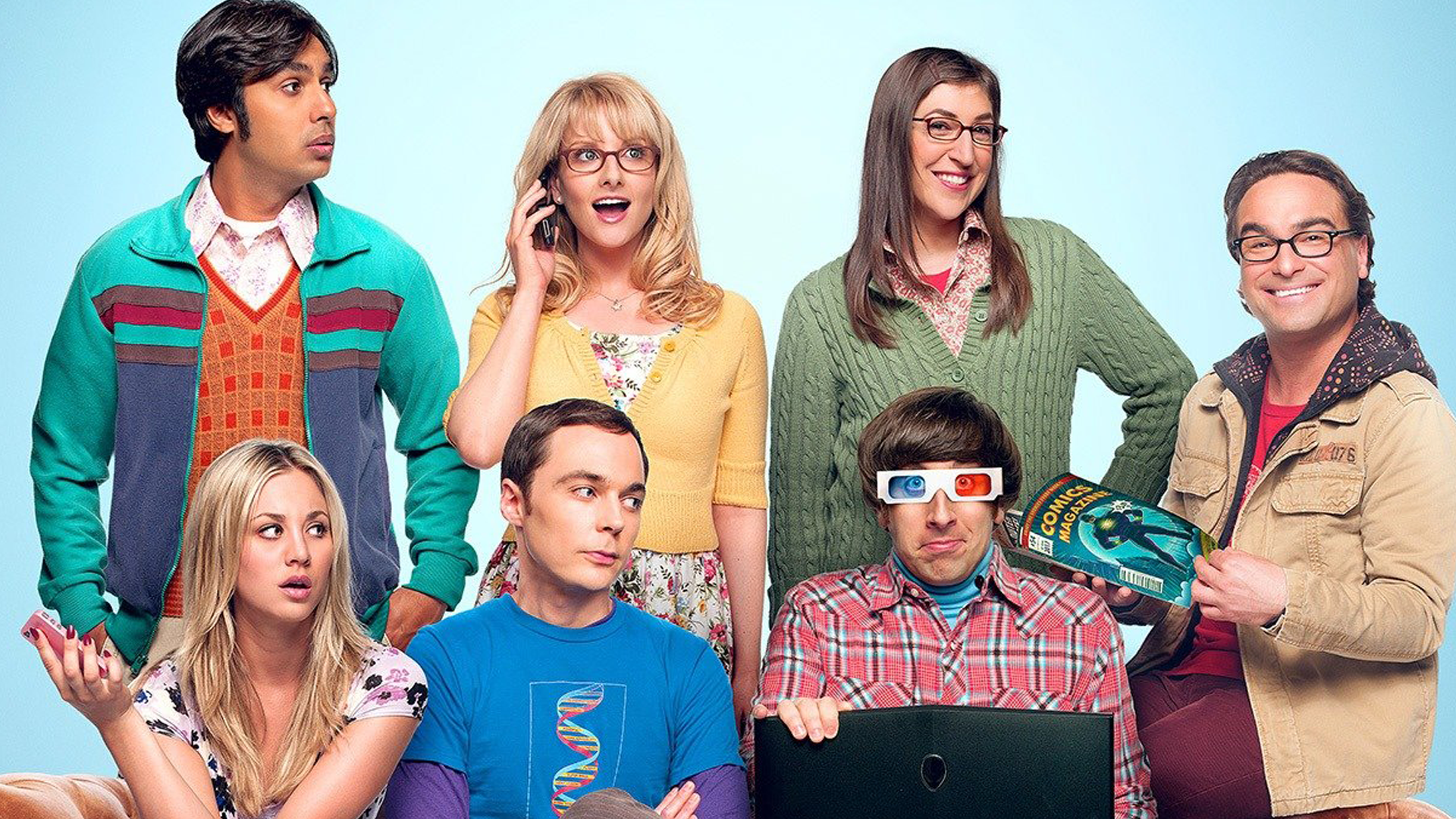 The Big Bang Theory characters - Amy, Penny, Sheldon, Raj, Howard, Bernadette and Leonard all sitting on a sofa