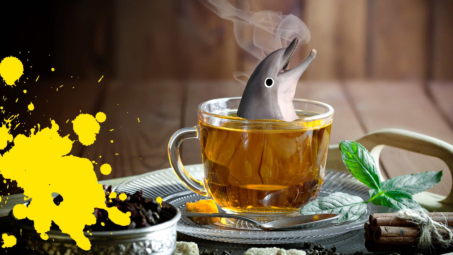 Steaming cup of tea with splat and Beano dolphin