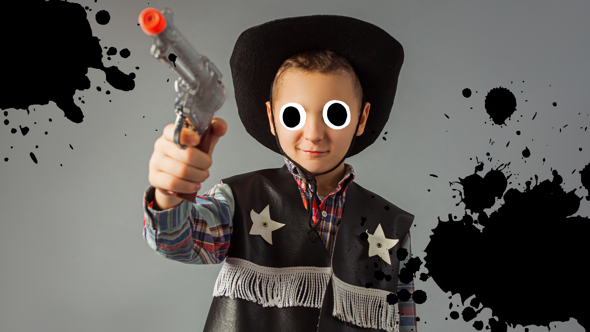 Boy dressed as sheriff with splats