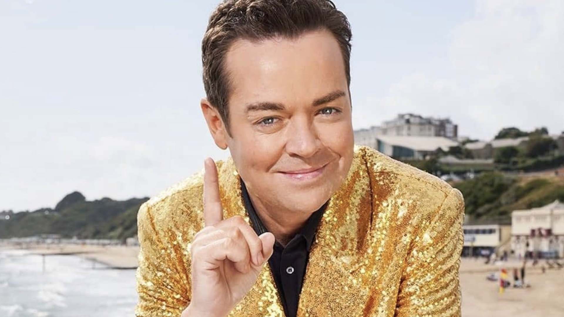 Stephen Mulhern in a gold jacket