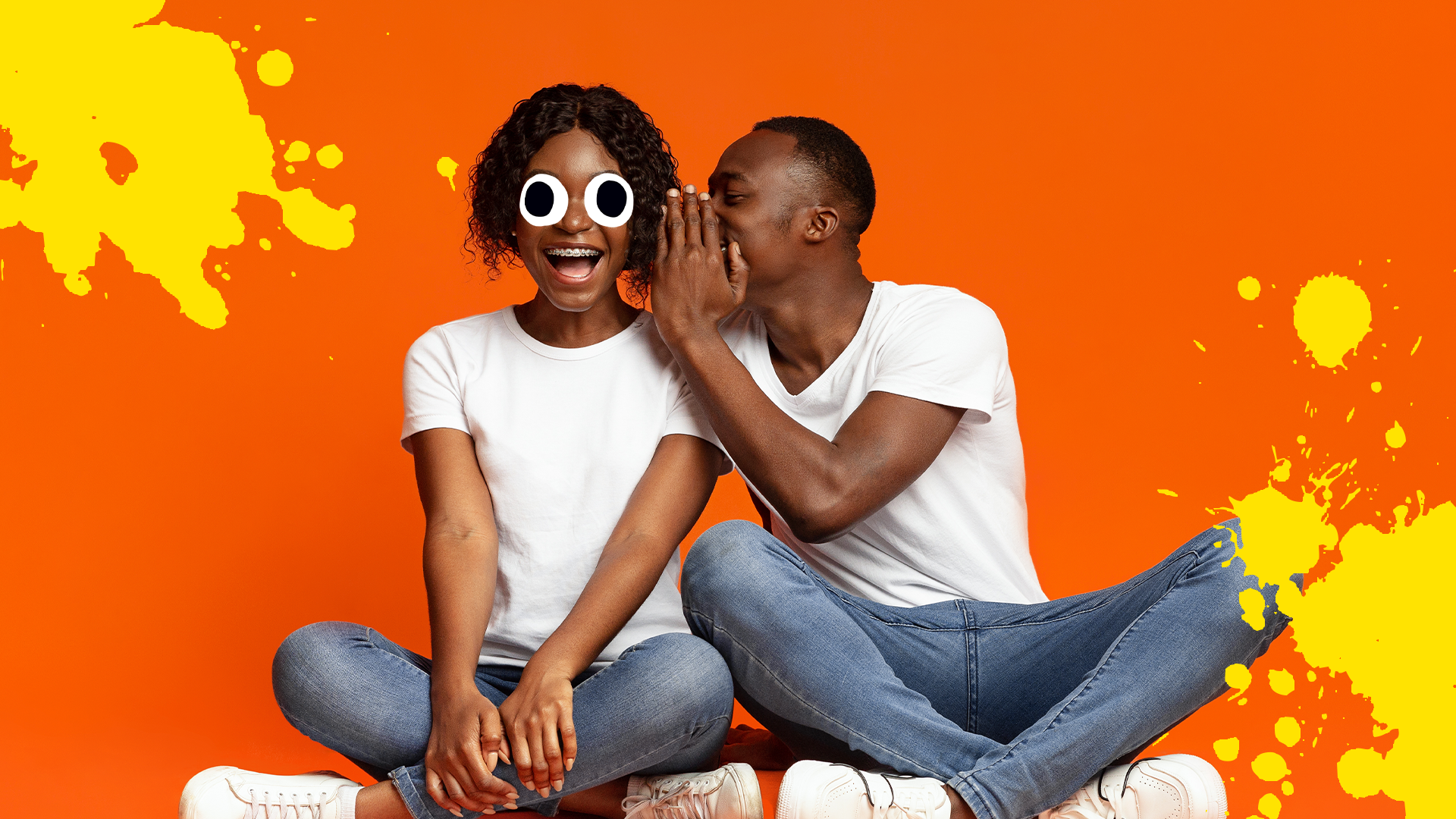 Man whispering to woman on orange background with splats