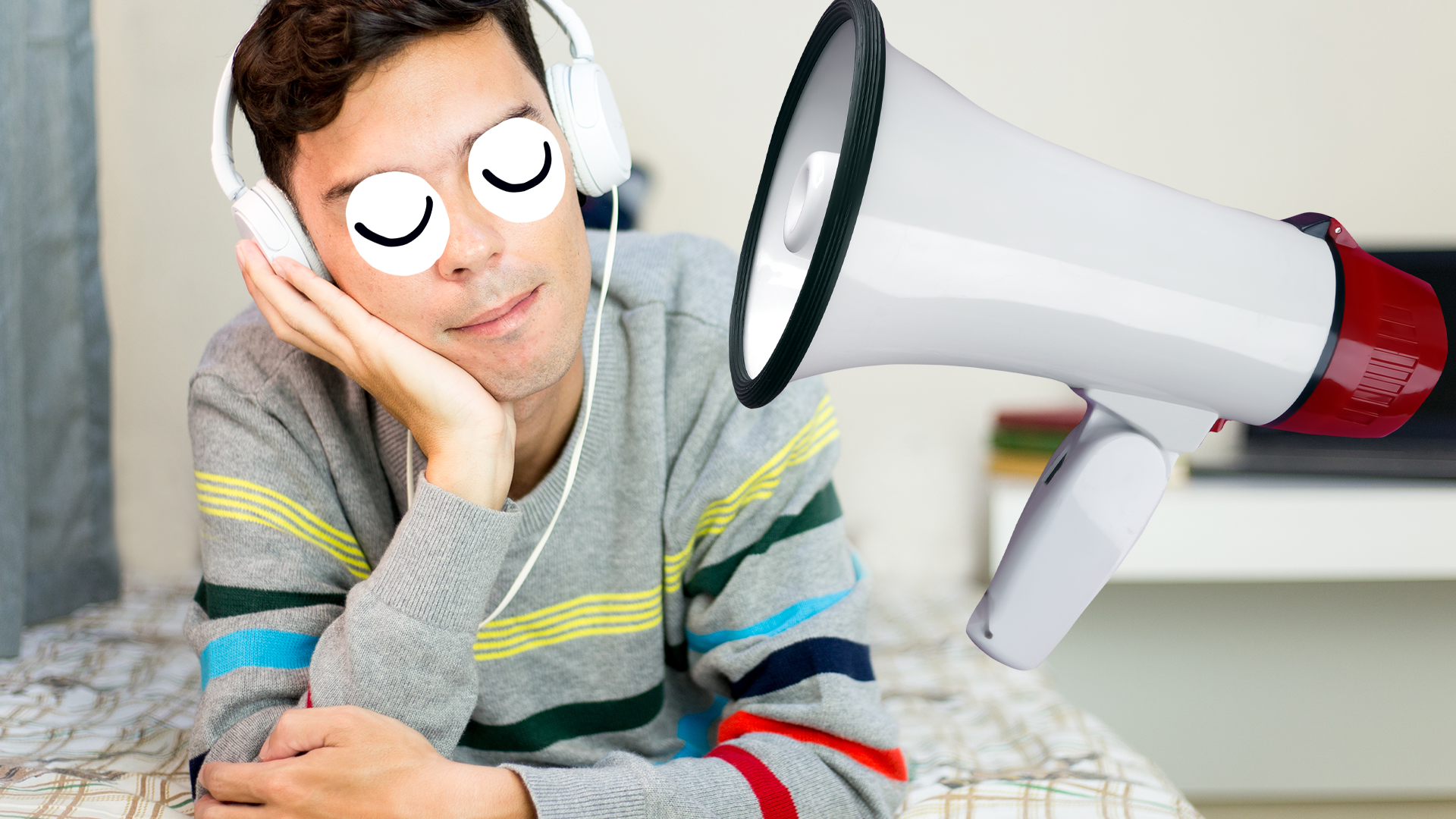 Man listening to headphones on bed with Beano megaphone