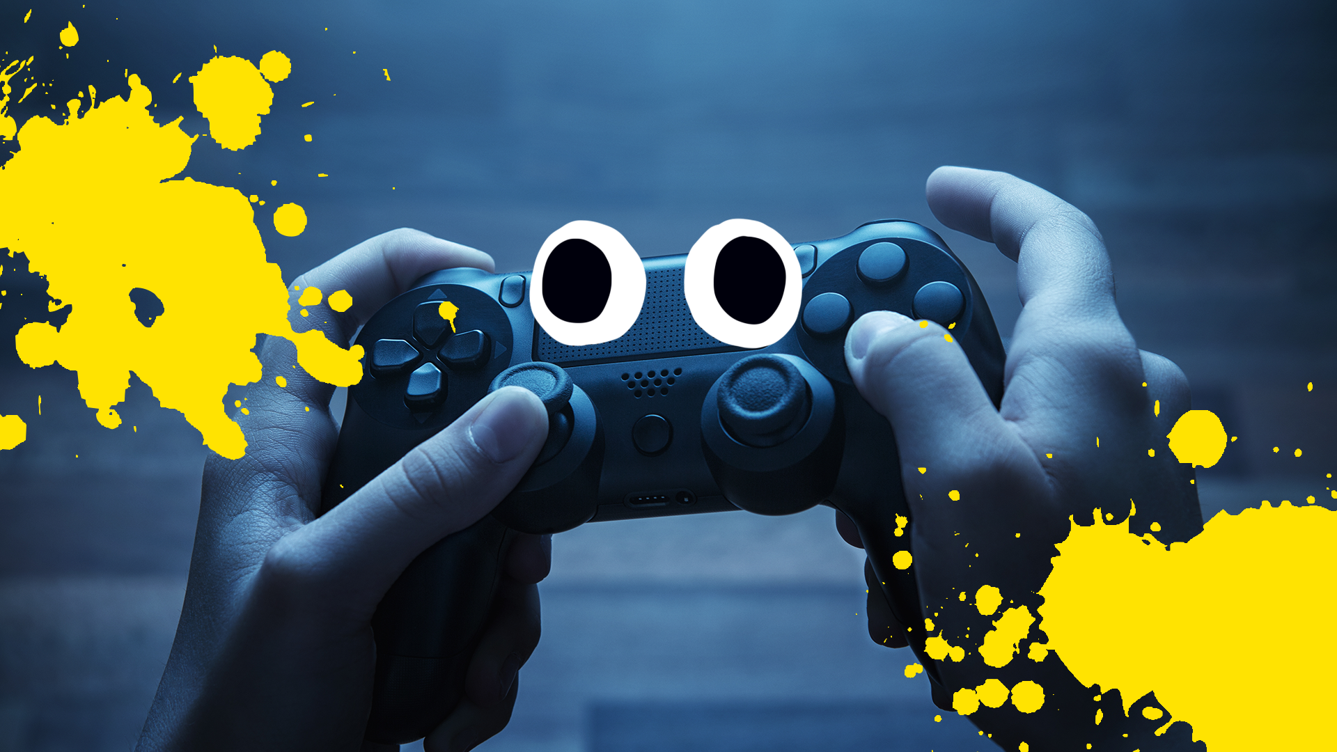 Hands holding gaming console with eyes and splats
