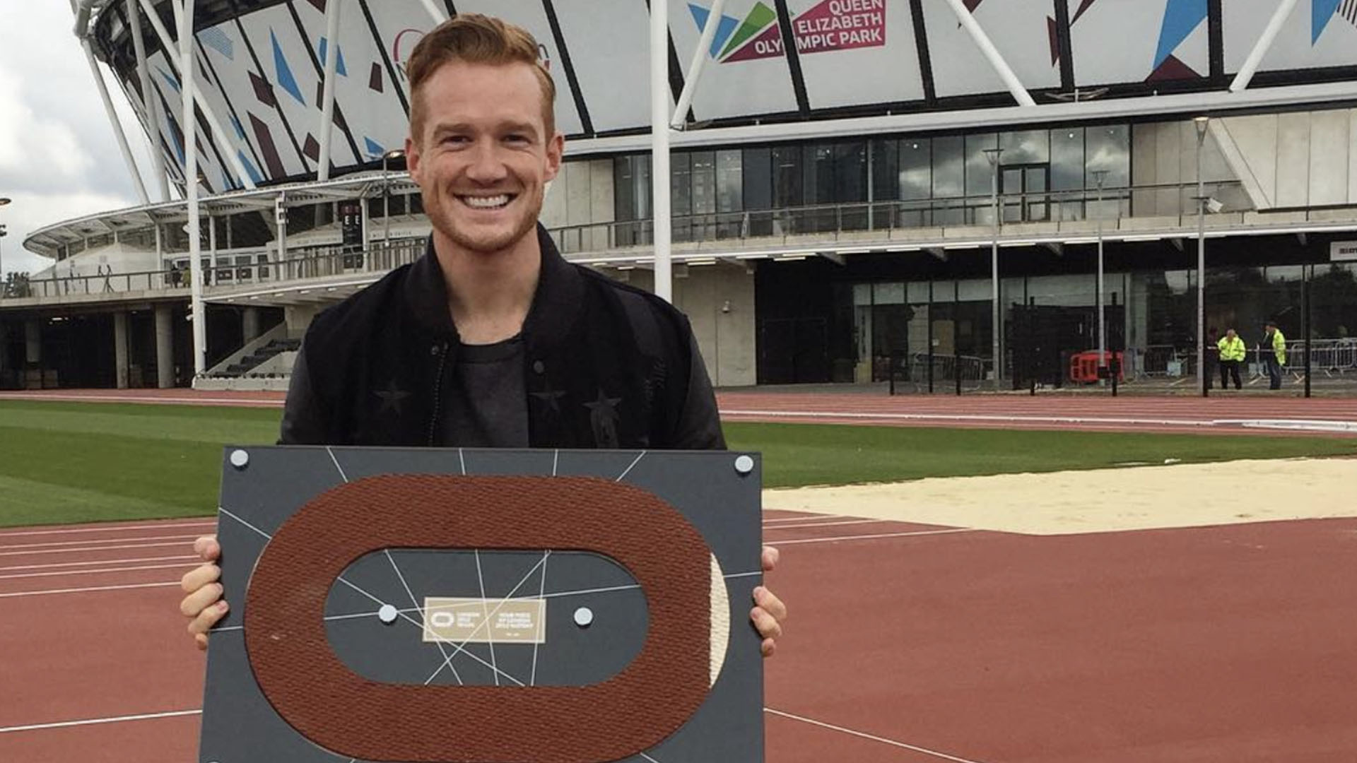 Greg Rutherford and a piece of the Olympic Stadium track