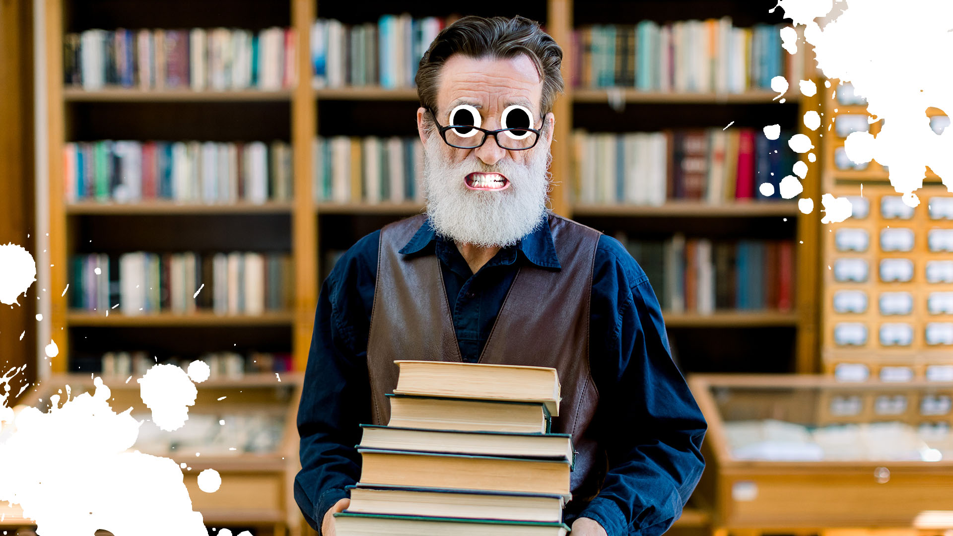 A bearded librarian holding books