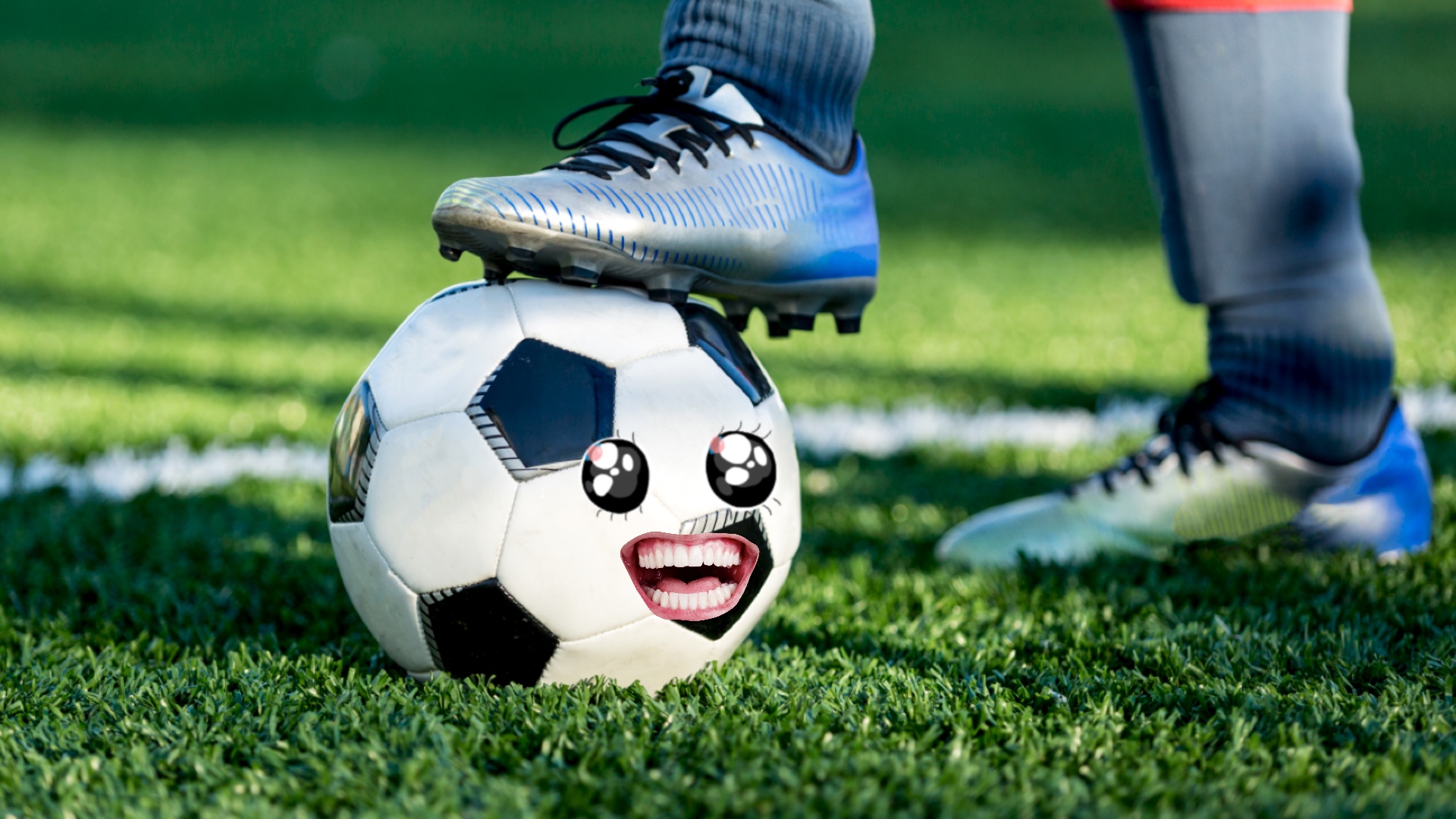 A football boot resting on a smiling football
