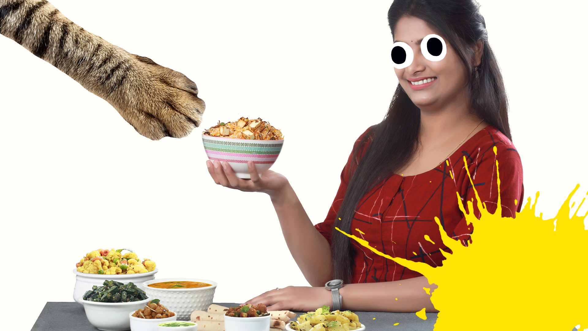 Smiling female chef with food and splat and cat paw