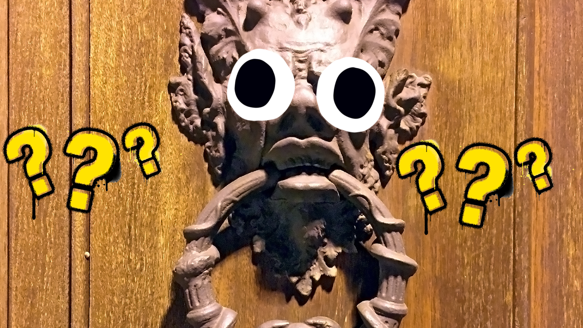 Doorknocker with face and question mark 