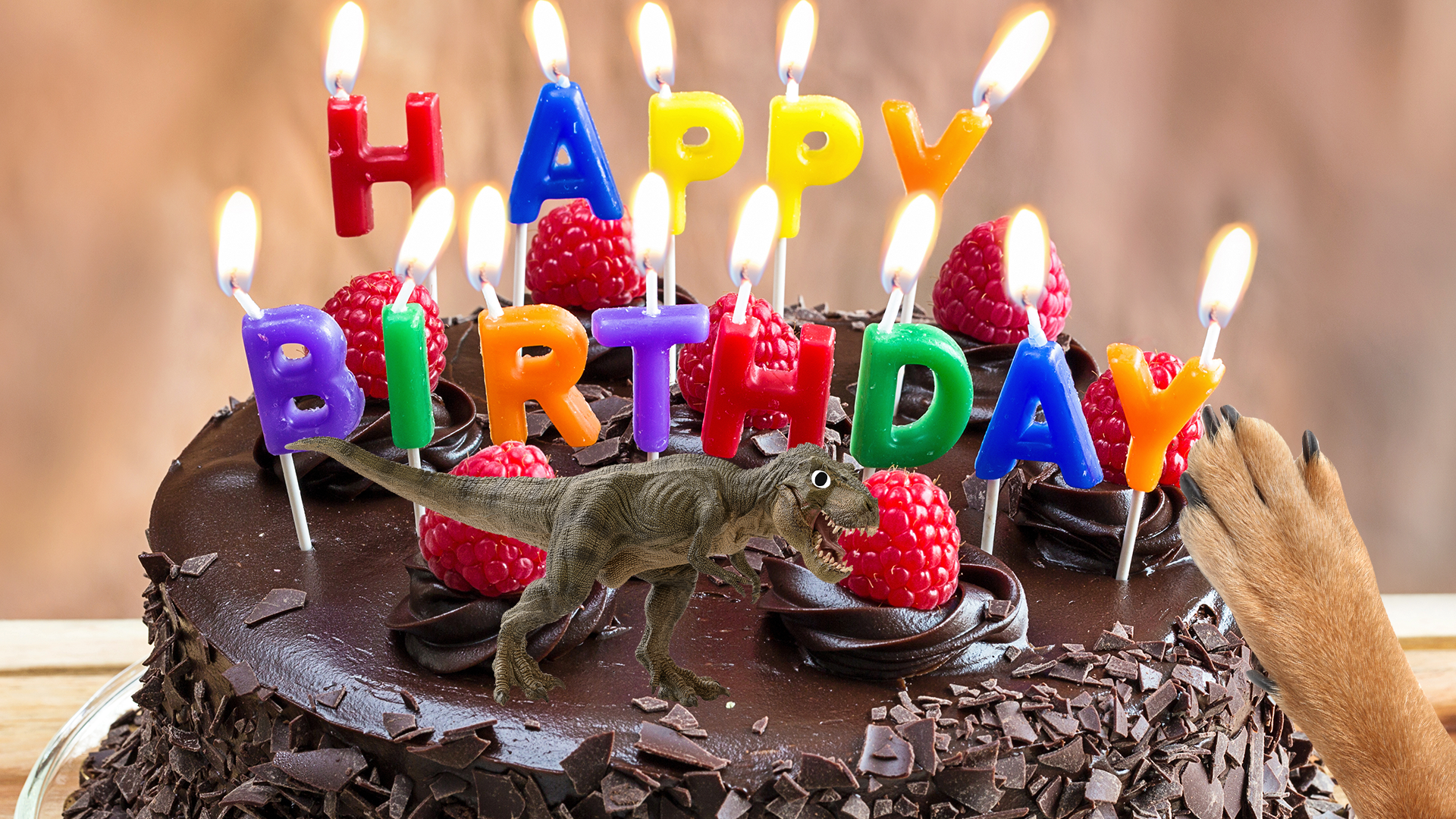 Birthday cake with dinosaur and paw