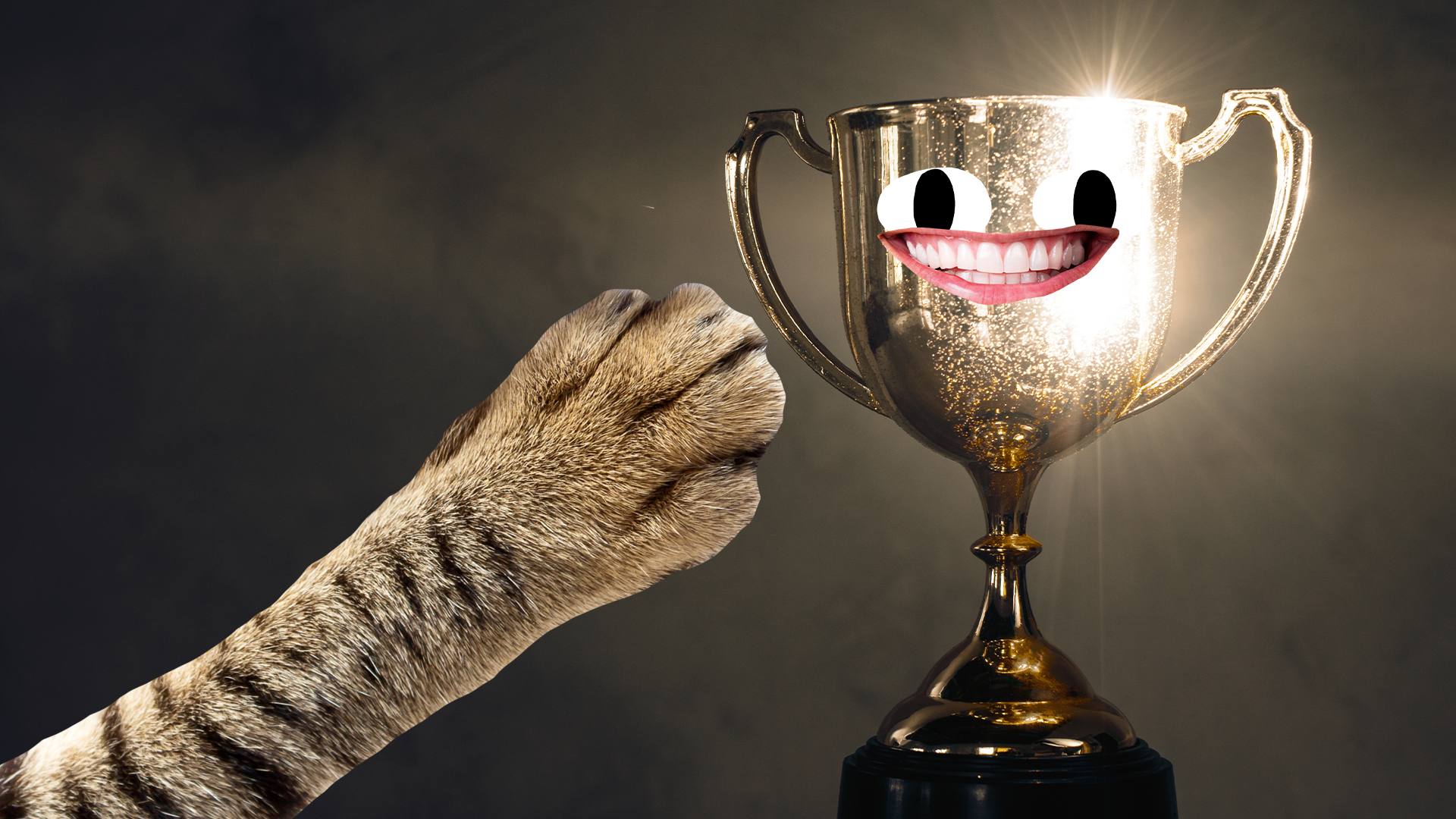 Trophy with Beano face and cat paw