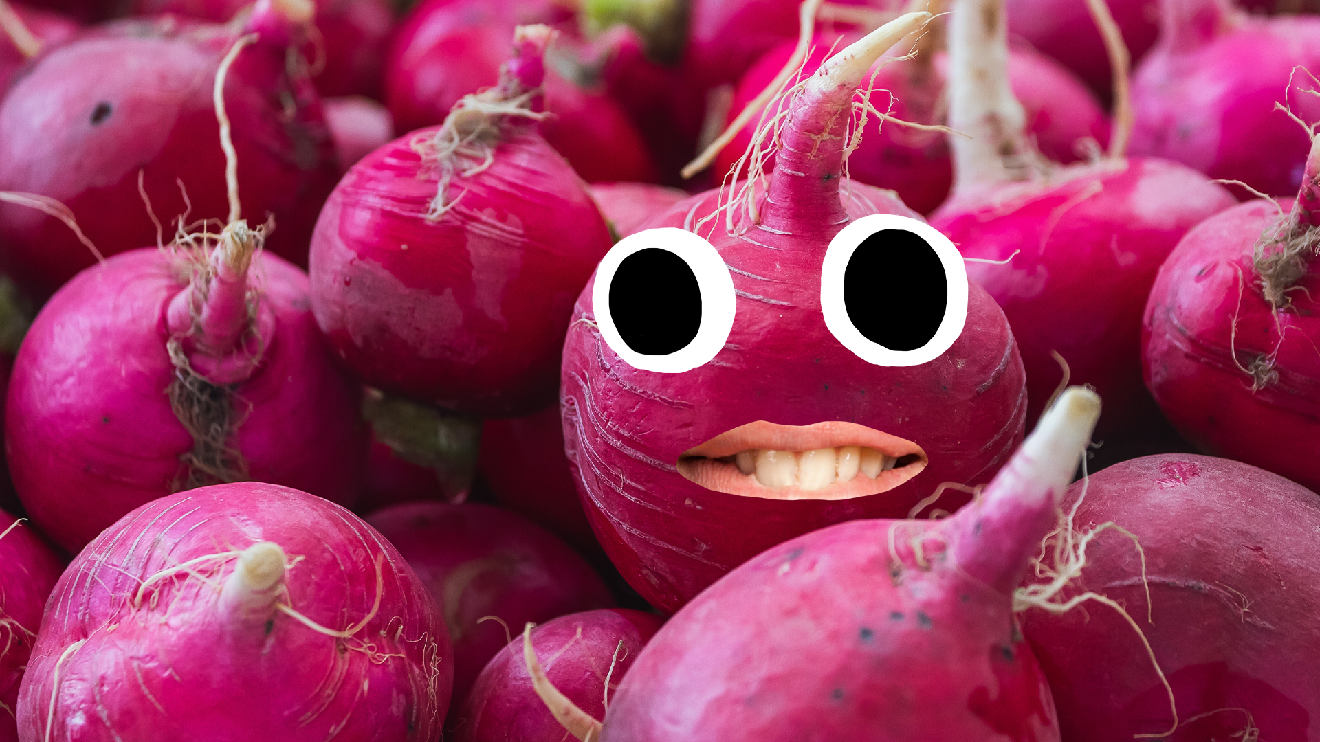 Radishes, one with goofy face