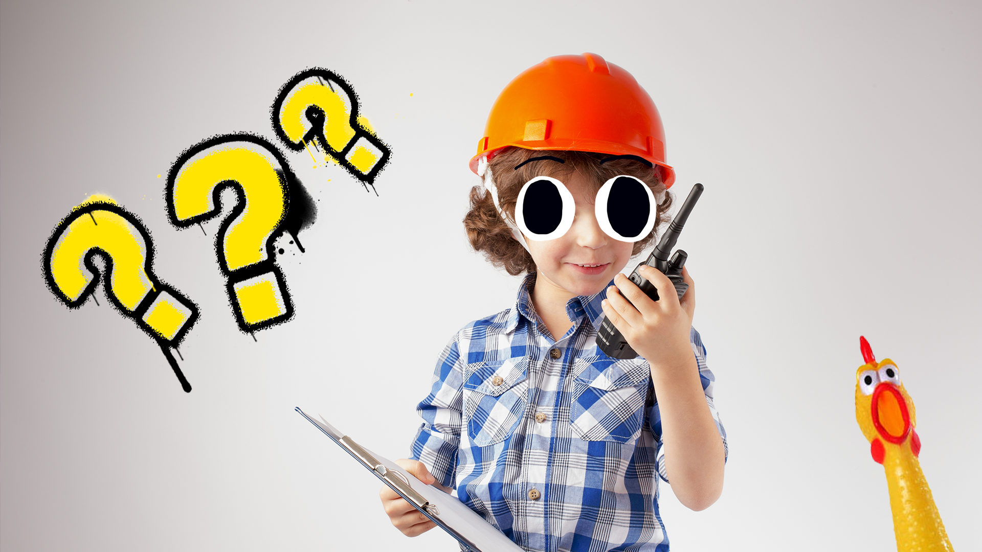 A young child dressed as a construction worker with a clipboard