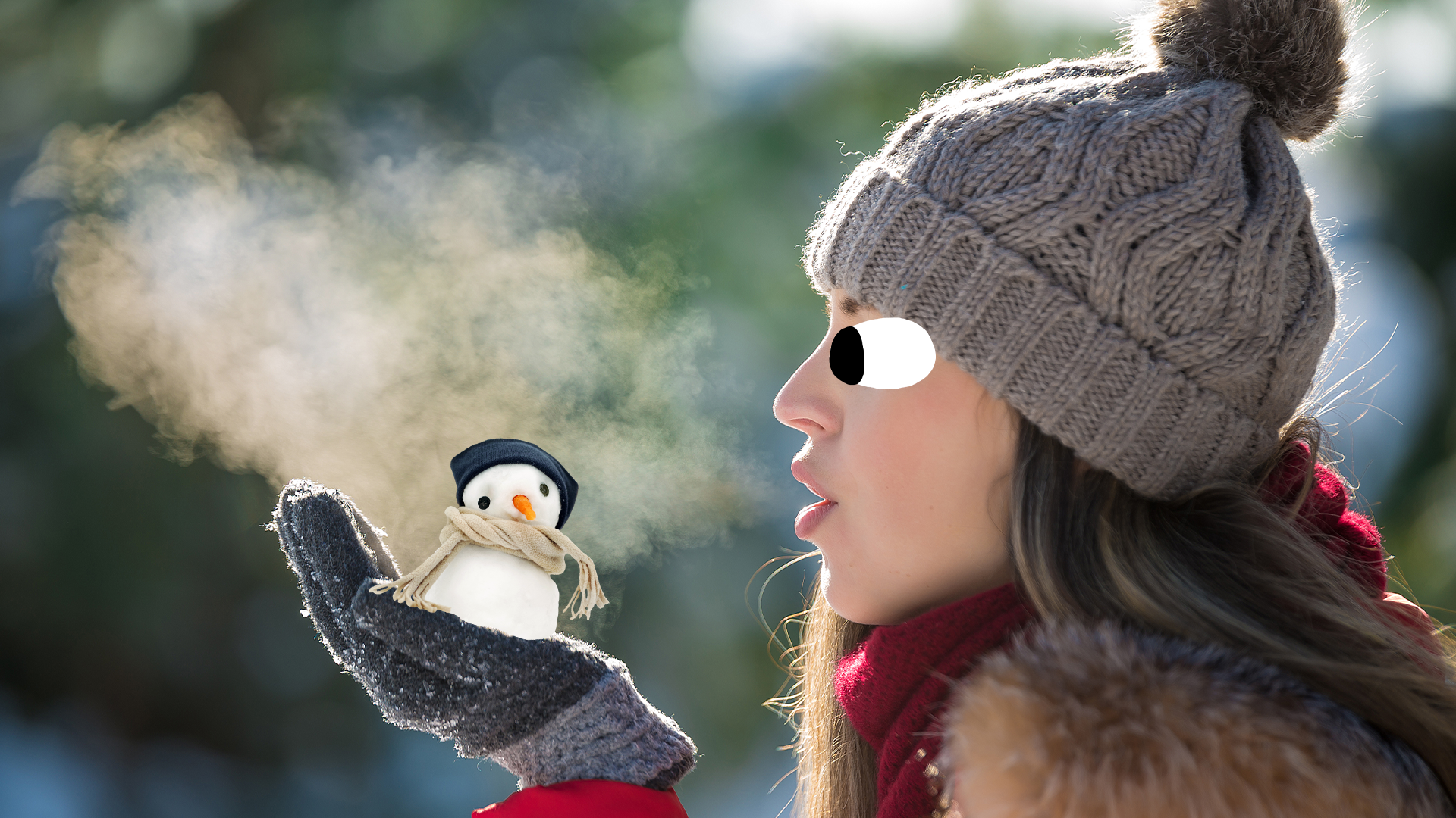 Woman blowing cold air on Beano snowman