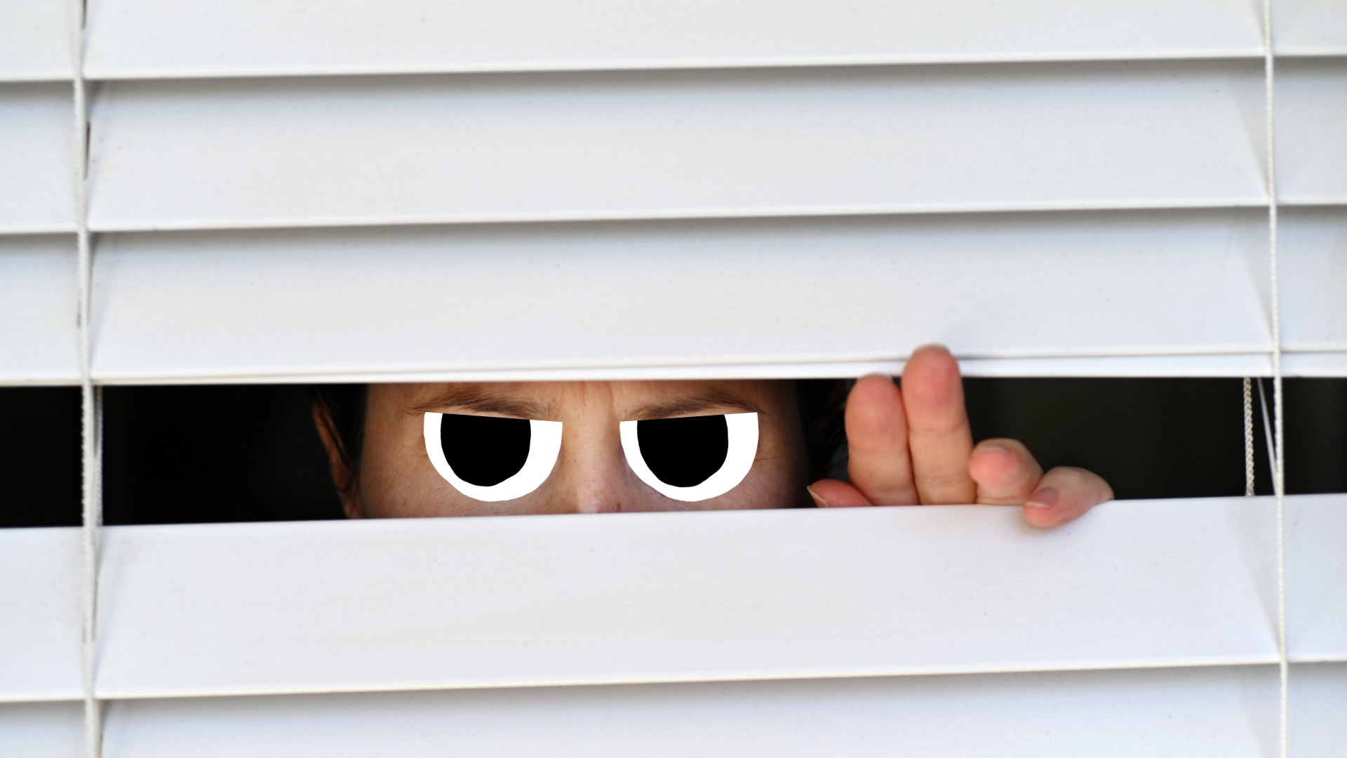Someone peeking through blinds