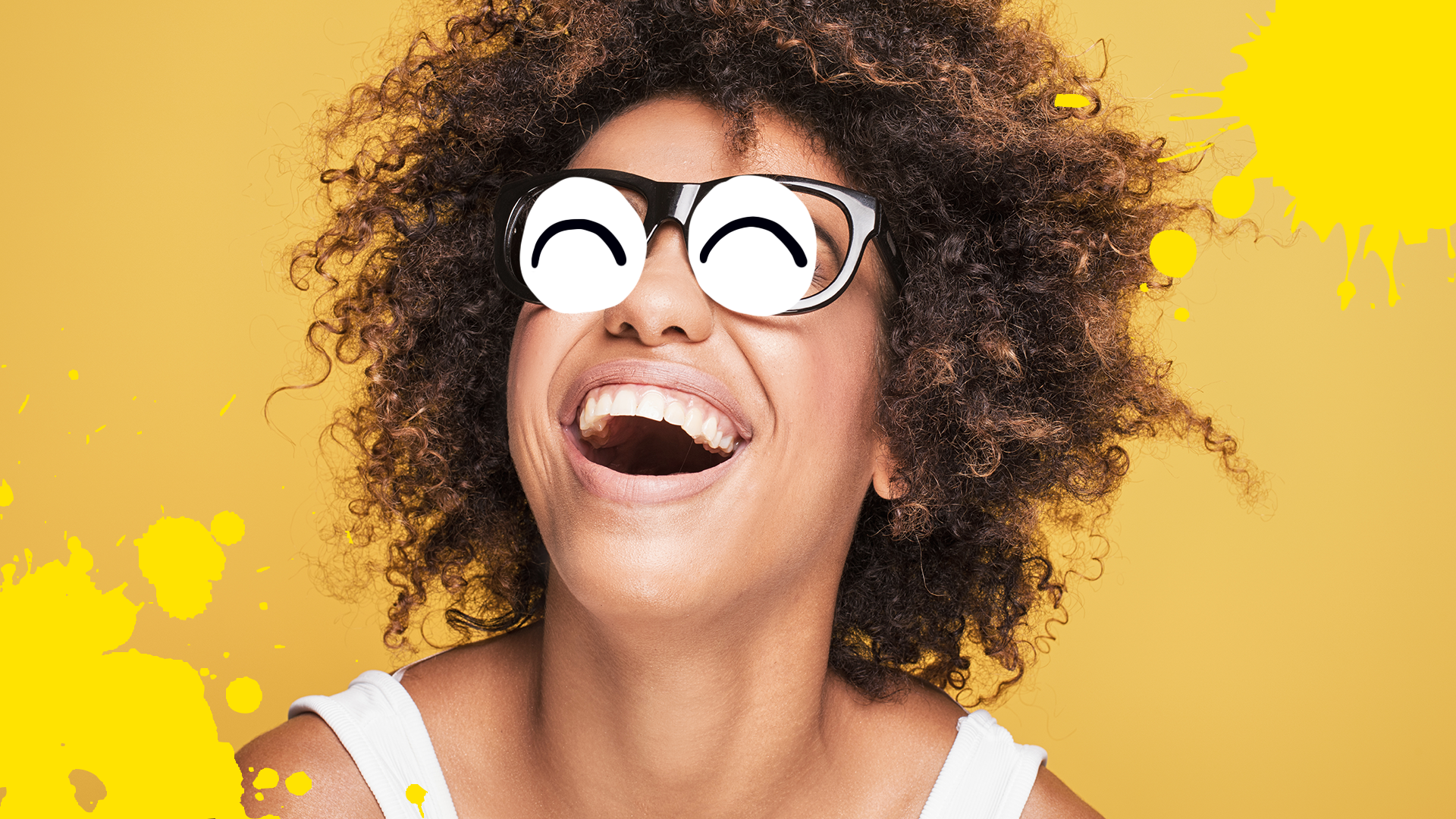 Woman laughing on orange background with splats