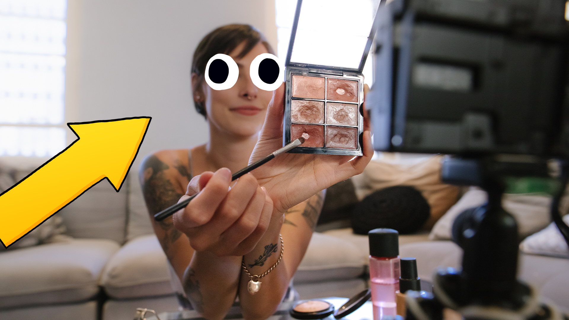Woman filming a makeup video