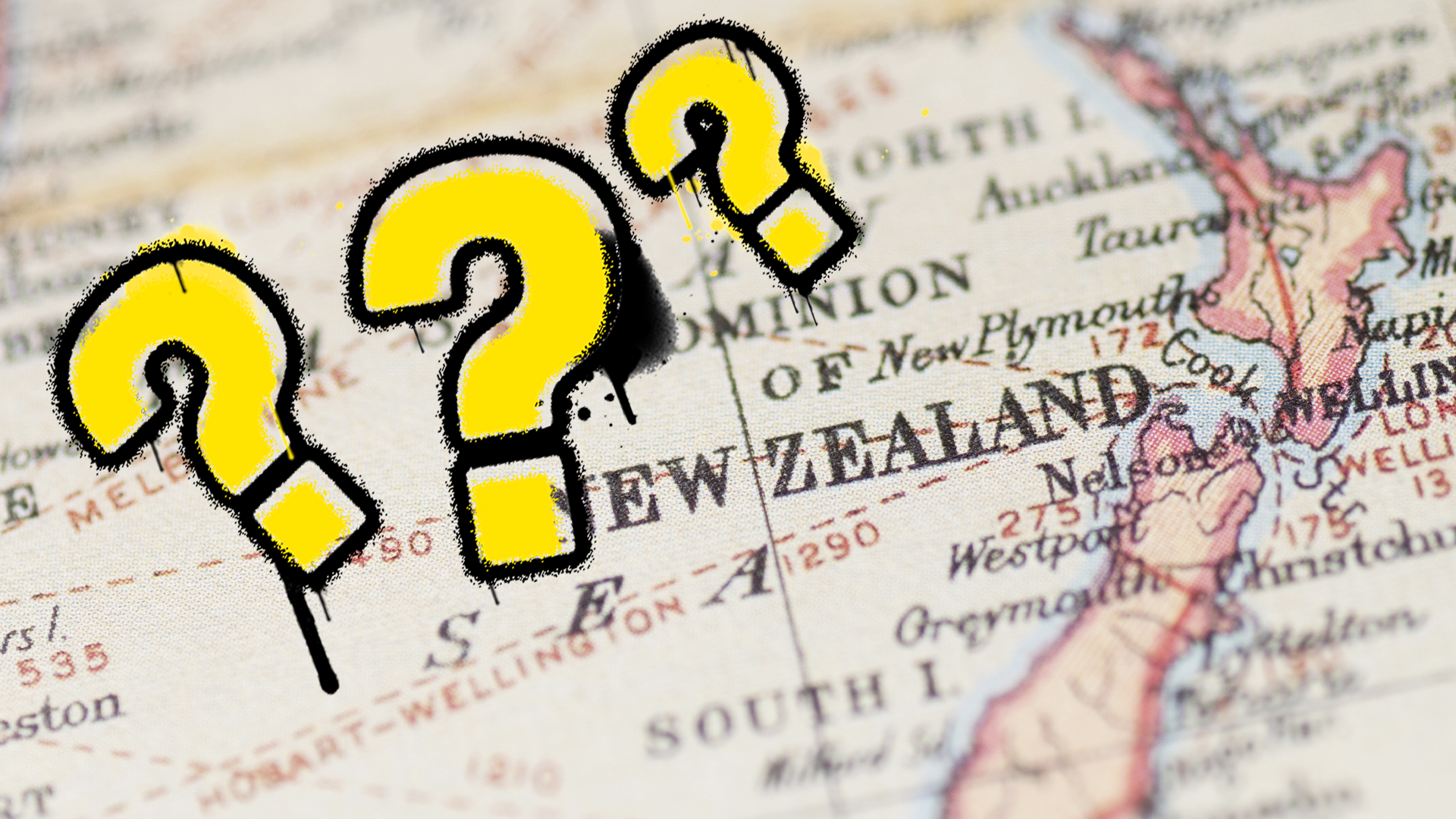 Map of New Zealand and question marks