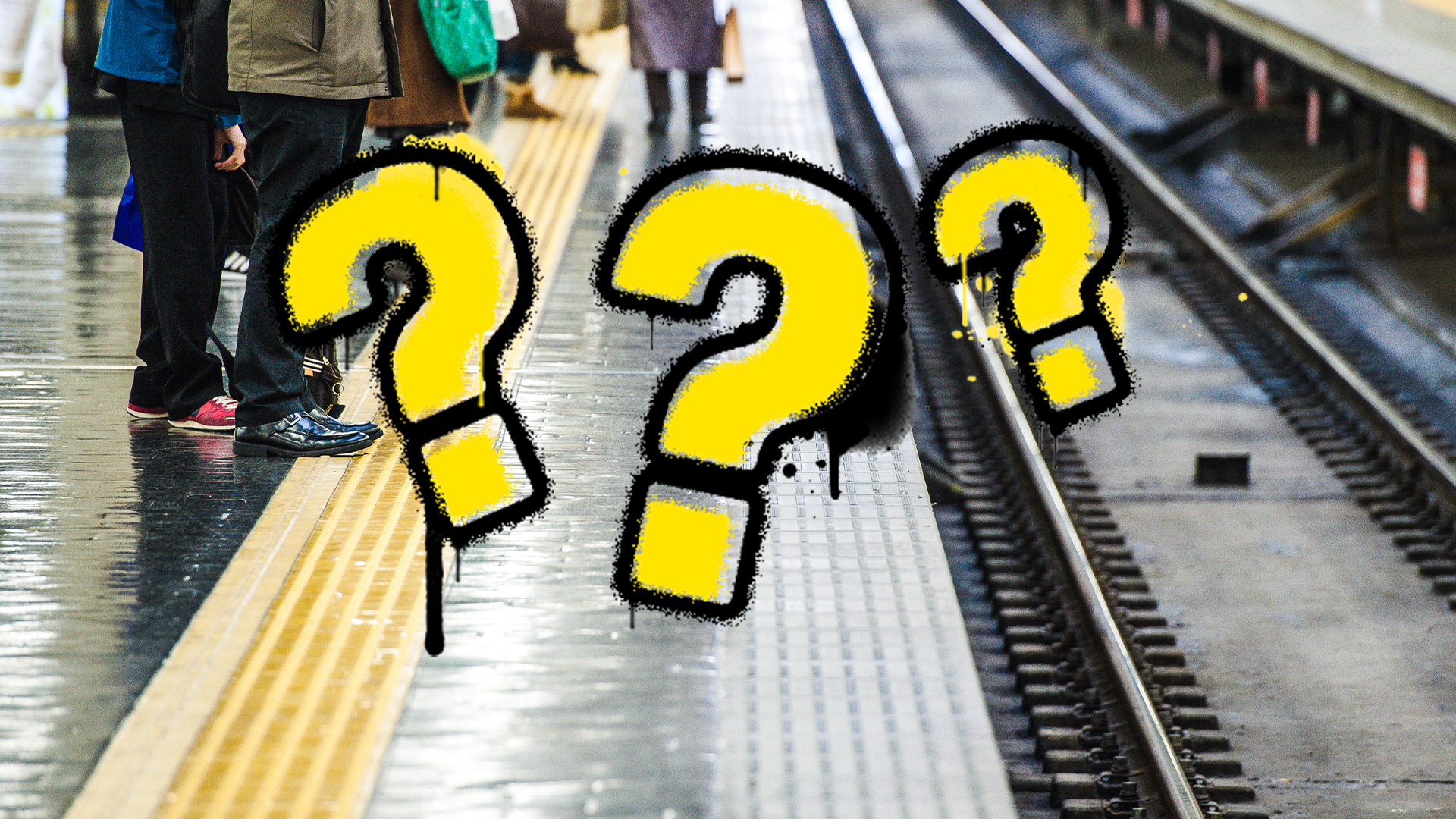 A train platform and question marks
