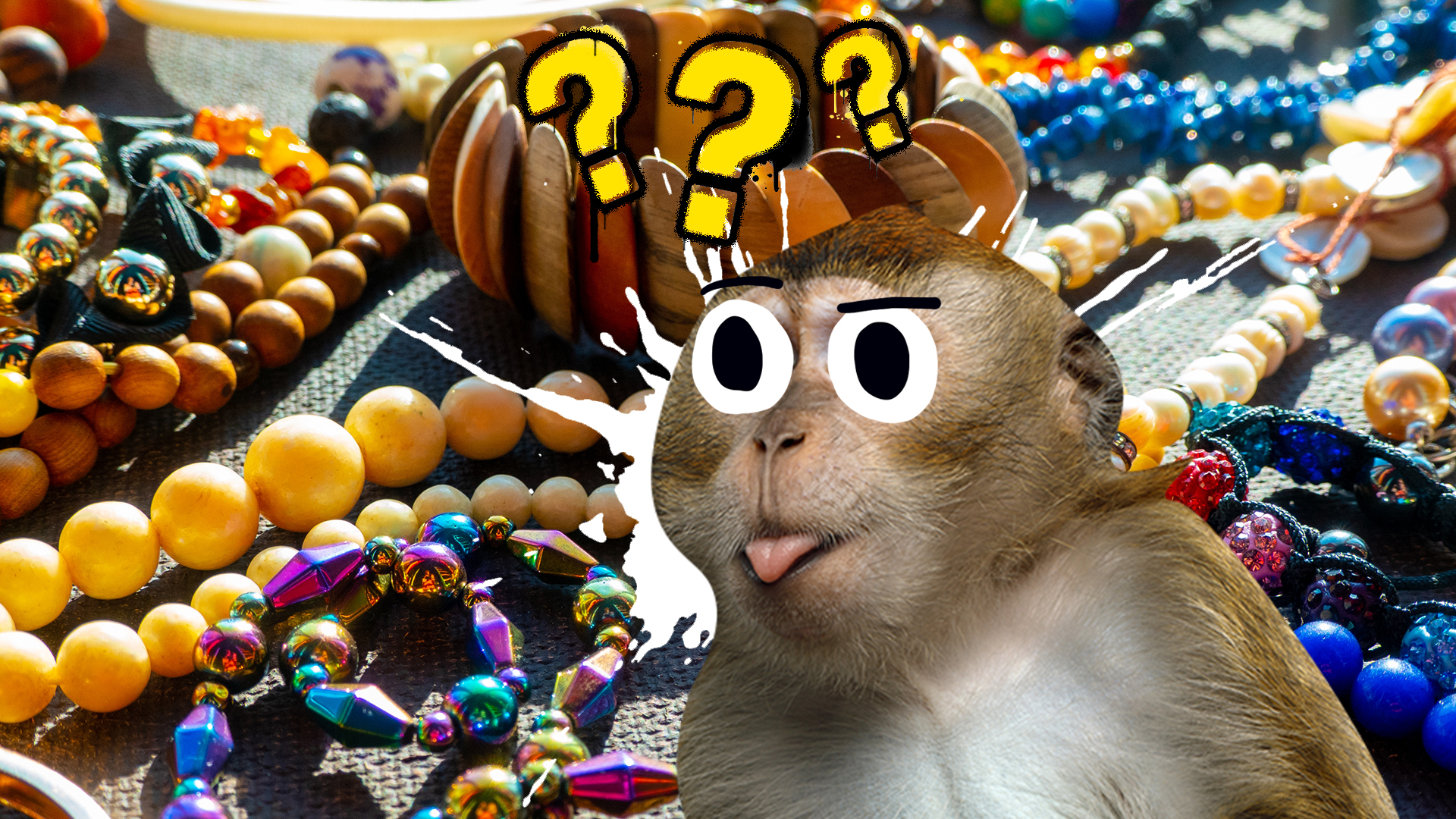A monkey surrounded by necklaces