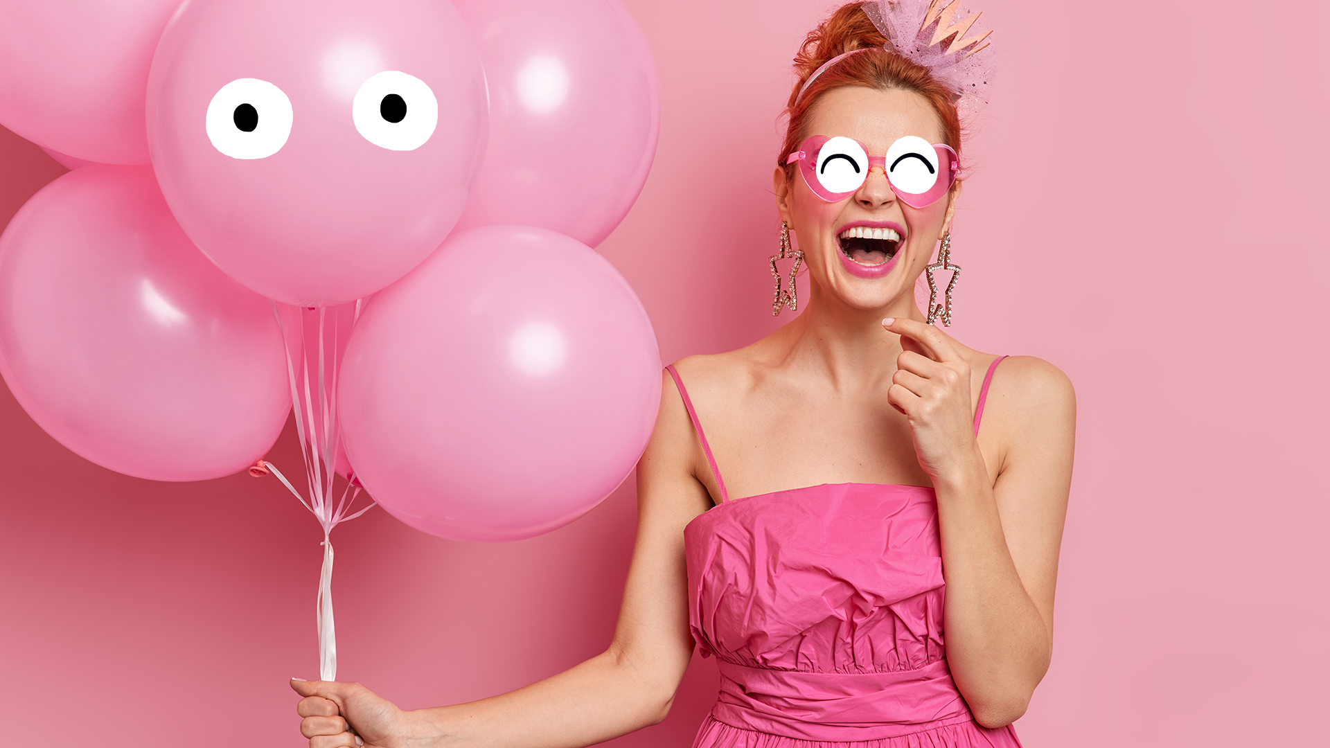 Woman in pink holding balloons