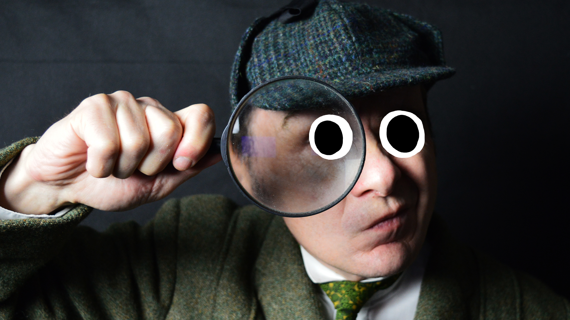 Sherlock Holmes looking through magnifying glass