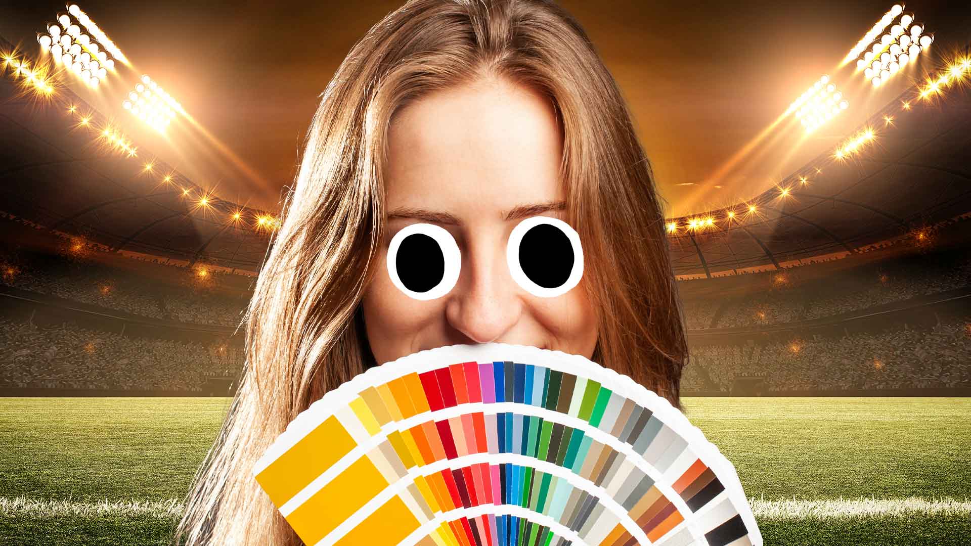 A football fan holding a colour chart
