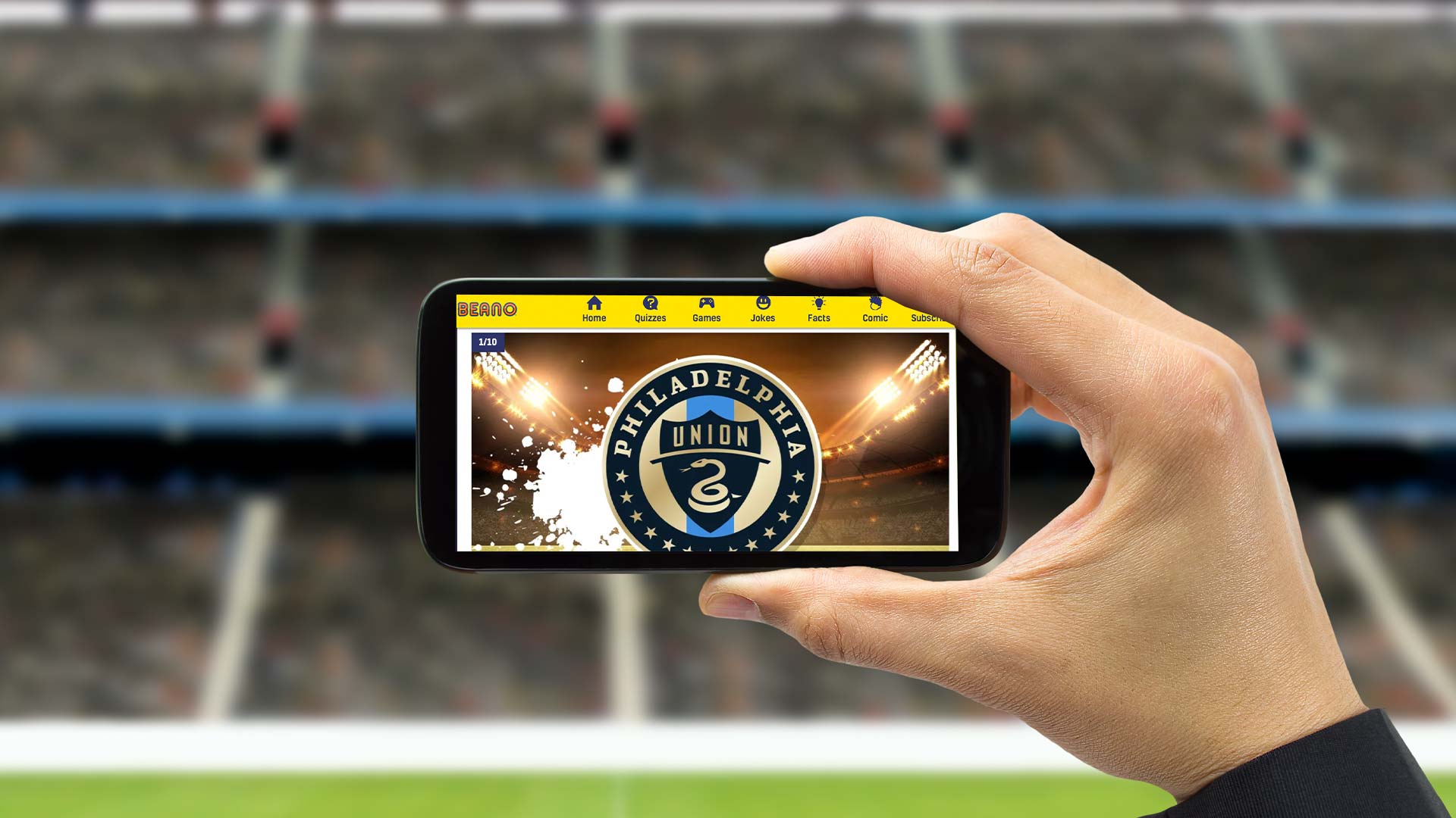 A person looking at this Philadelphia Union quiz on their smartphone in a  stadium