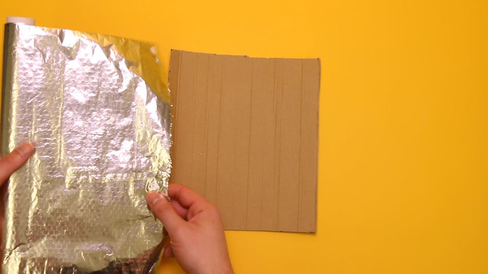 Cover the rectangle with foil using sticky tape to secure the edges