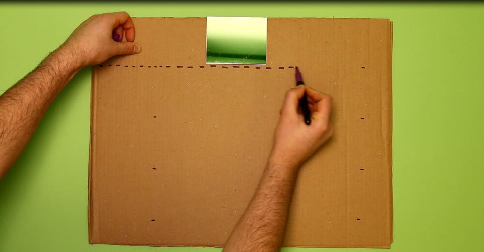 Draw out 4 lanes on your cardboard sheet
