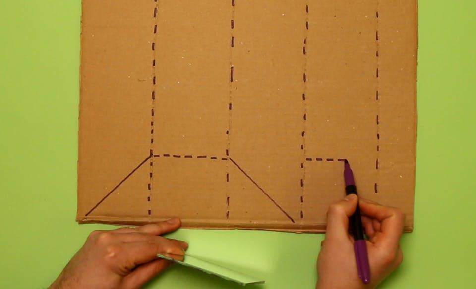 Using your mirror as a measurement, draw a triangle, square, and triangle along the bottom of the cardboard. Draw a second square in the final right lane.