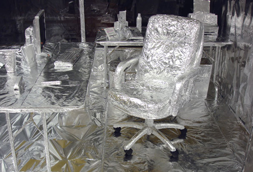 An office covered in foil