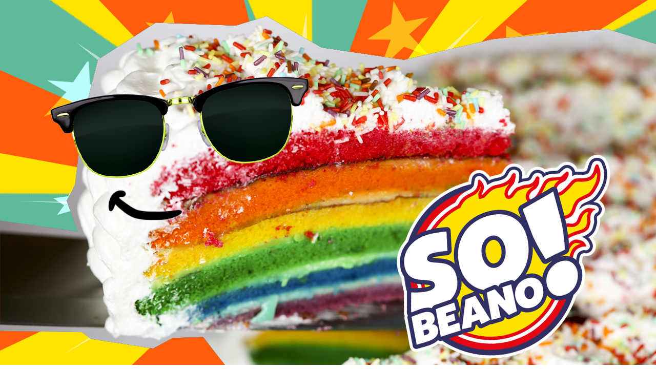 a SO BEANO rainbow cake with sunglasses on