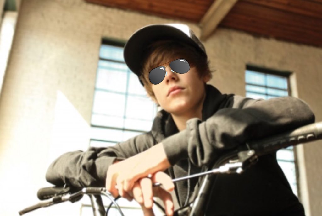 Justin Bieber on a bike