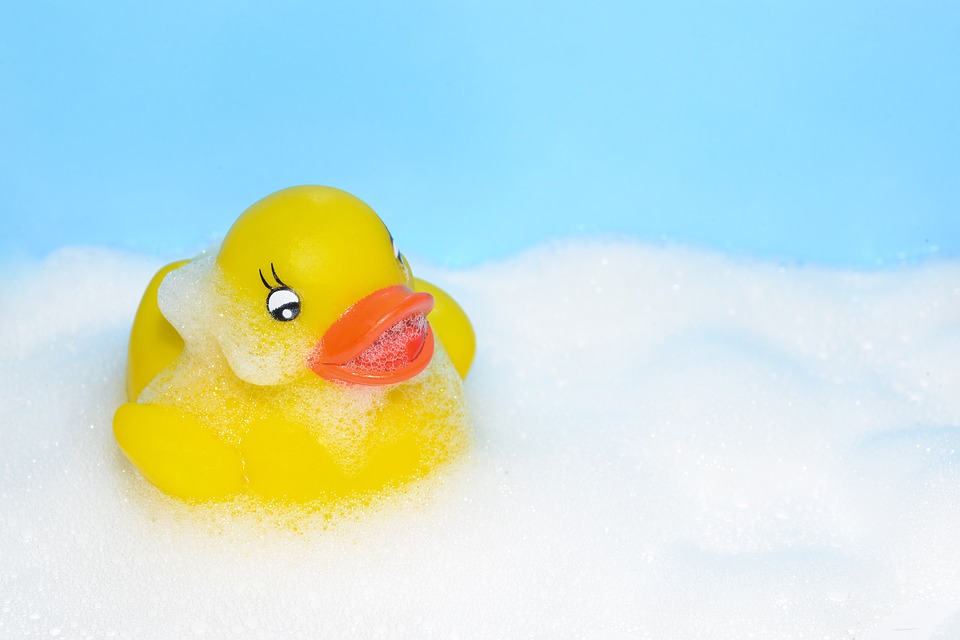 A rubber duck in a bubble bath