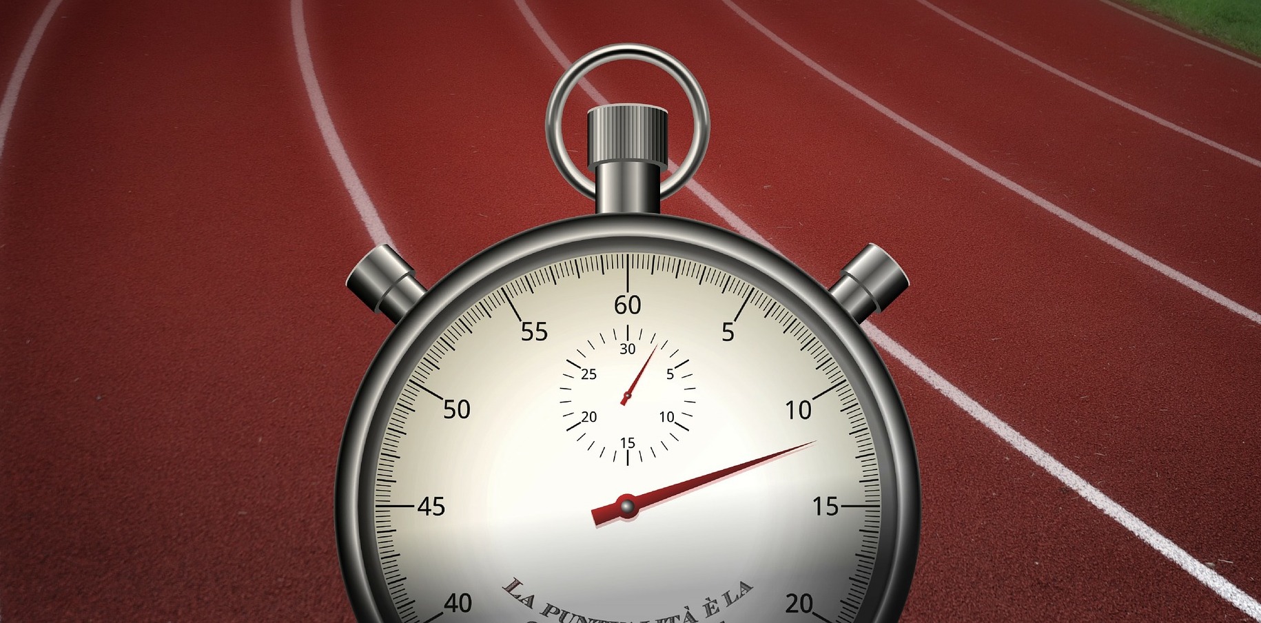 A stopwatch and an athletics track