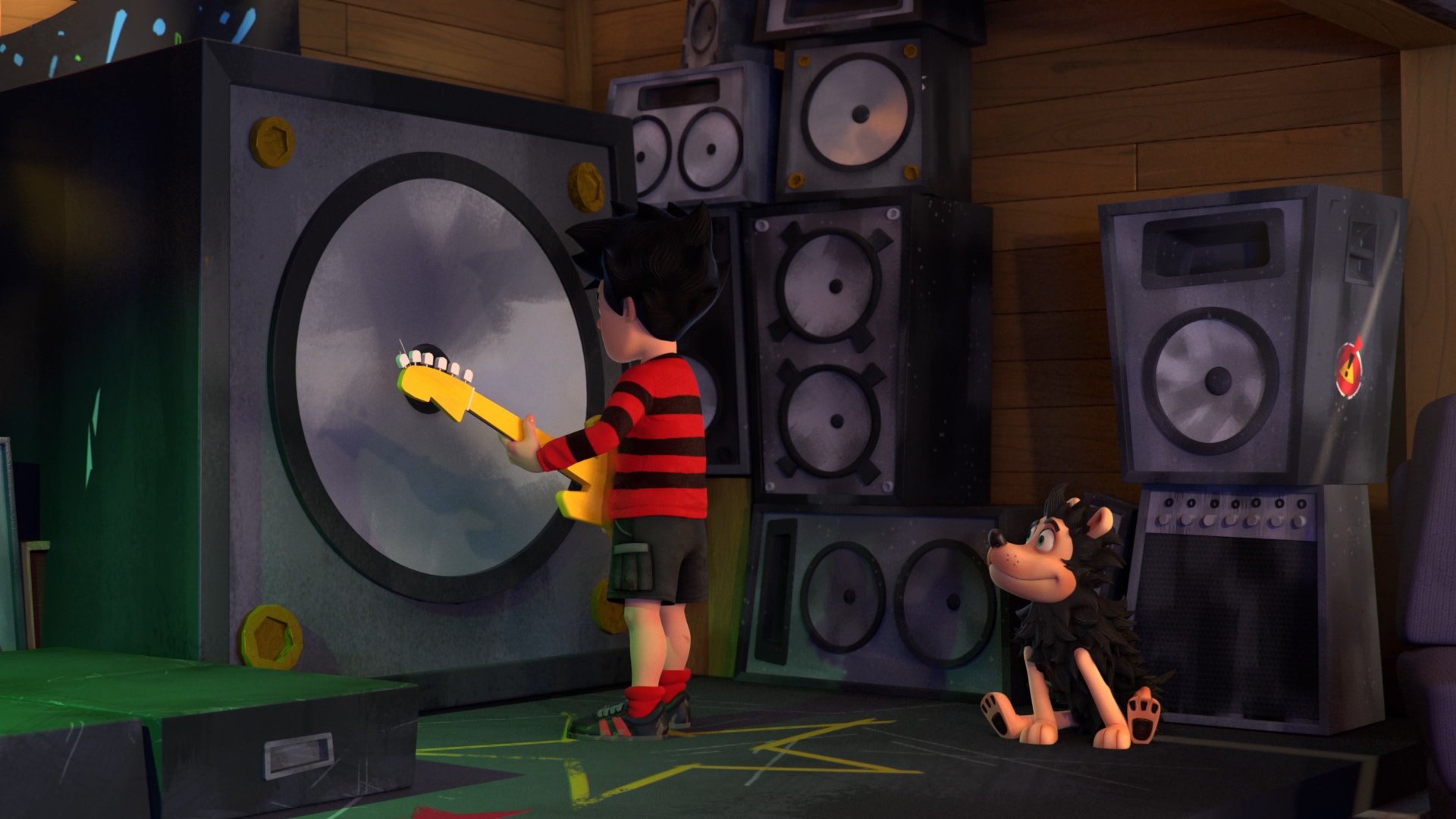 Dennis and Gnasher in front of the speakers