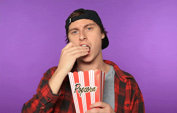 A man eating popcorn