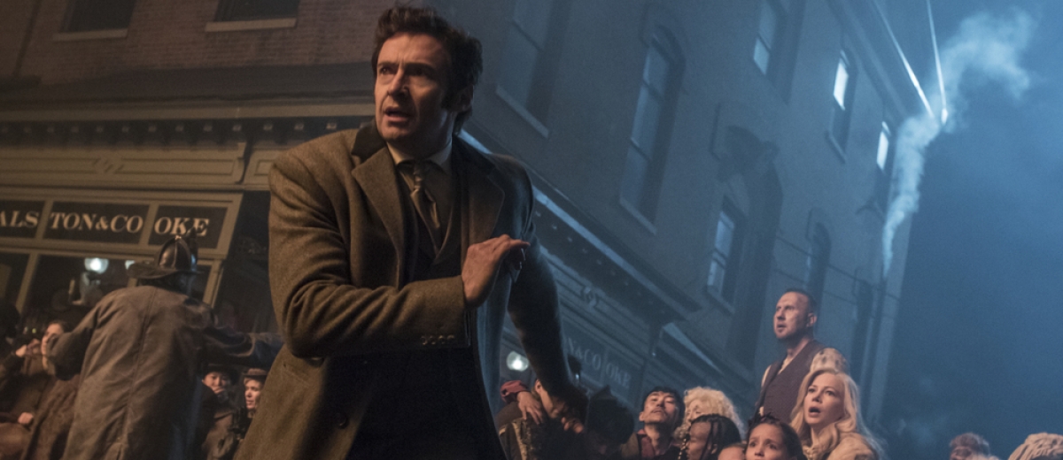 Hugh Jackman looks scared in a scene from The Greatest Showman